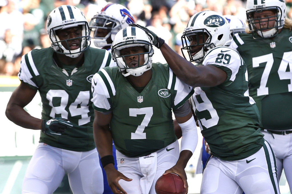 New York Jets Smith carries the ball after scoring a touchdown against the Buffalo Bills in the first quarter during their NFL football game in East Rutherford